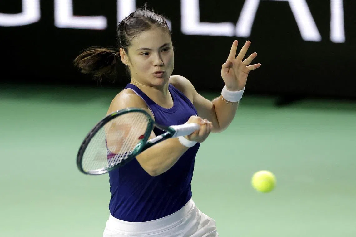 Britain's Emma Raducanu in action during her win over Canada's Rebecca Marino at the Billie Jean King Cup Finals at the Palacio de Deportes Jose Maria Martin Carpena Arena on Nov 17. Britain prevailed 2-0 to set up a semi-final clash against Slovakia.