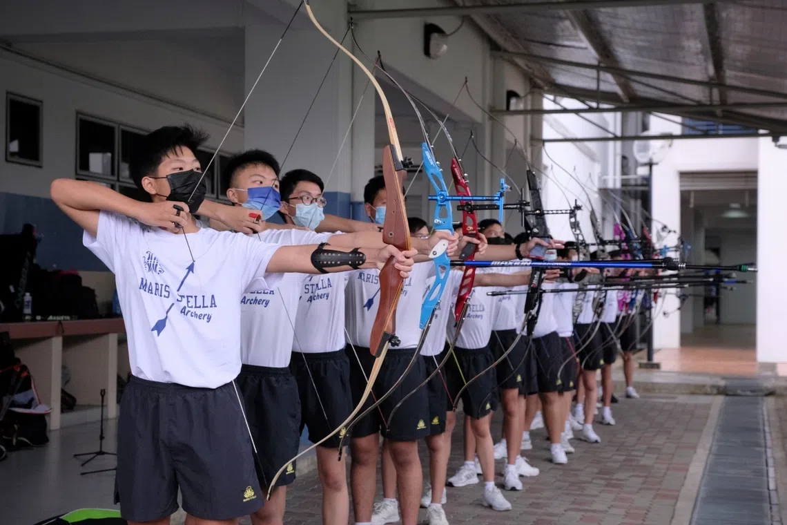 Secondary schools offer a wide range of CCAs, including archery and Chinese opera