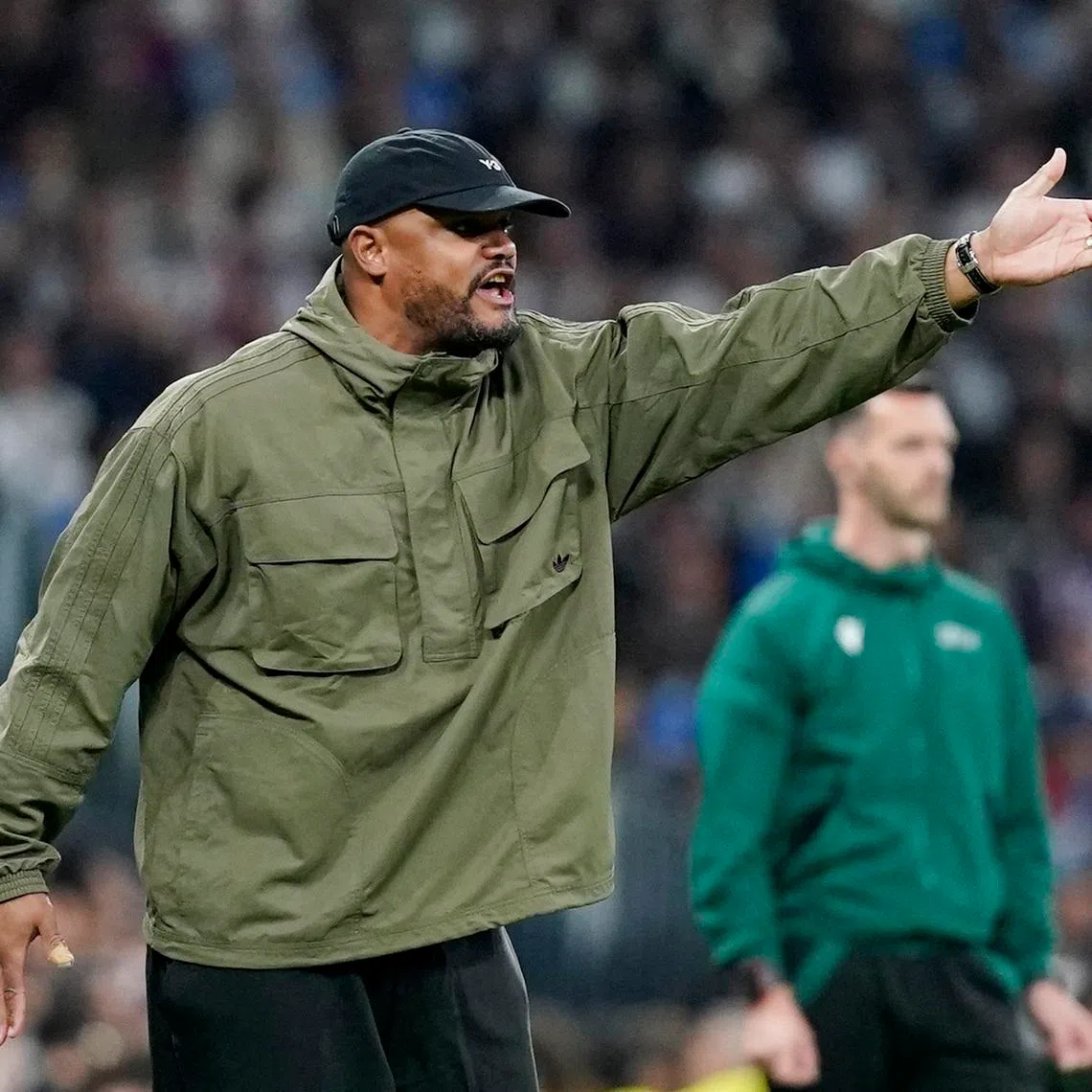 Soccer Football - UEFA Champions League - Quarter Final - First Leg - Real Madrid v Bayern Munich - Santiago Bernabeu, Madrid, Spain - April 7, 2026 Bayern Munich coach Vincent Kompany reacts REUTERS/Ana Beltran