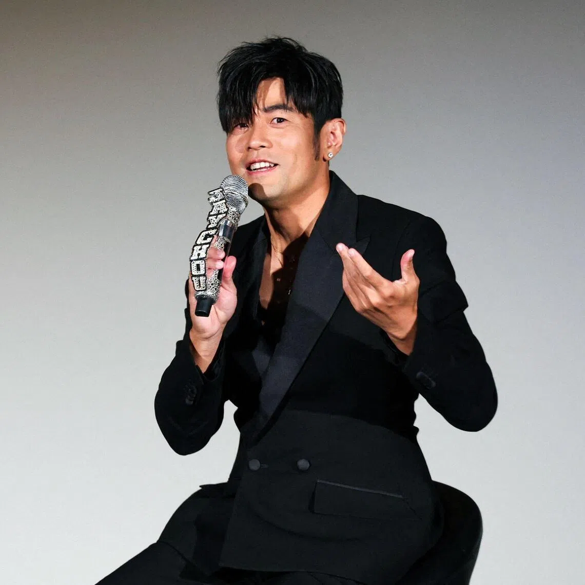 Taiwanese performer Jay Chou speaks during a press conference for the release of his new album 'Children of the Sun' in Taipei on March 24, 2026. (Photo by I-Hwa Cheng / AFP)
