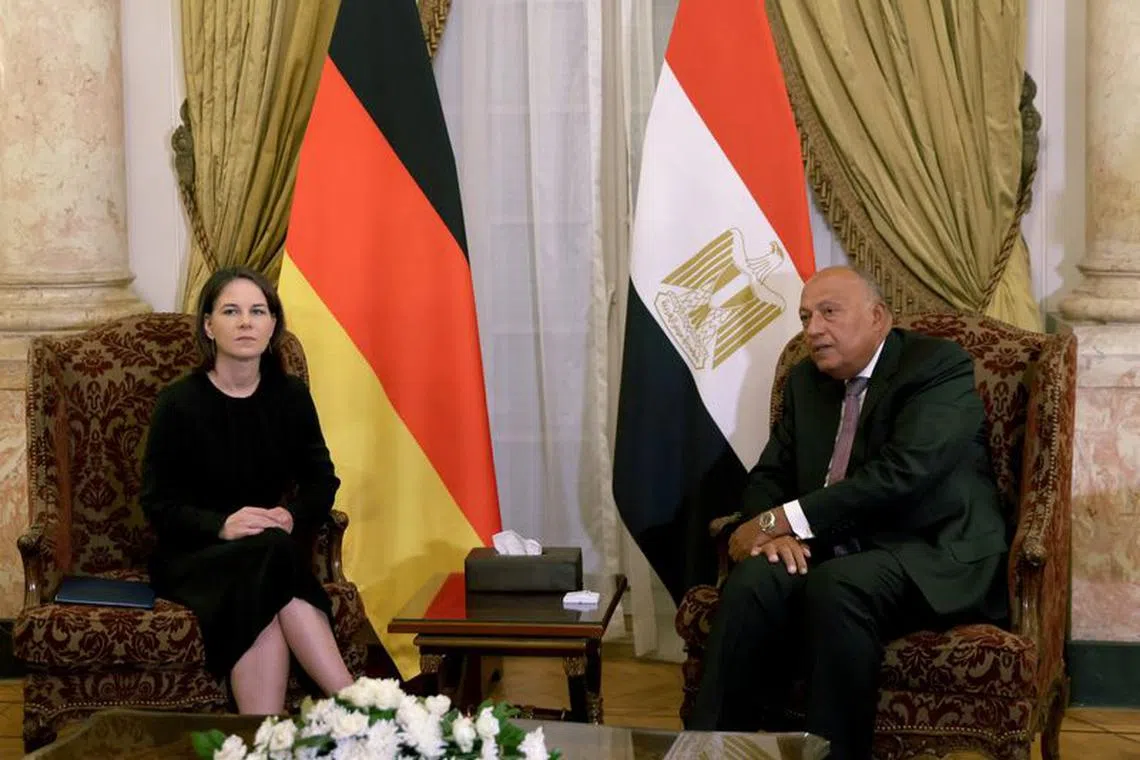 German Foreign Minister Annalena Baerbock meets with Egyptian Foreign Minister Sameh Shoukry, amid the ongoing conflict between Israel and Palestinian Islamist group Hamas, in Cairo, Egypt, October 14, 2023. REUTERS/Mohamed Abd El Ghany/File Photo