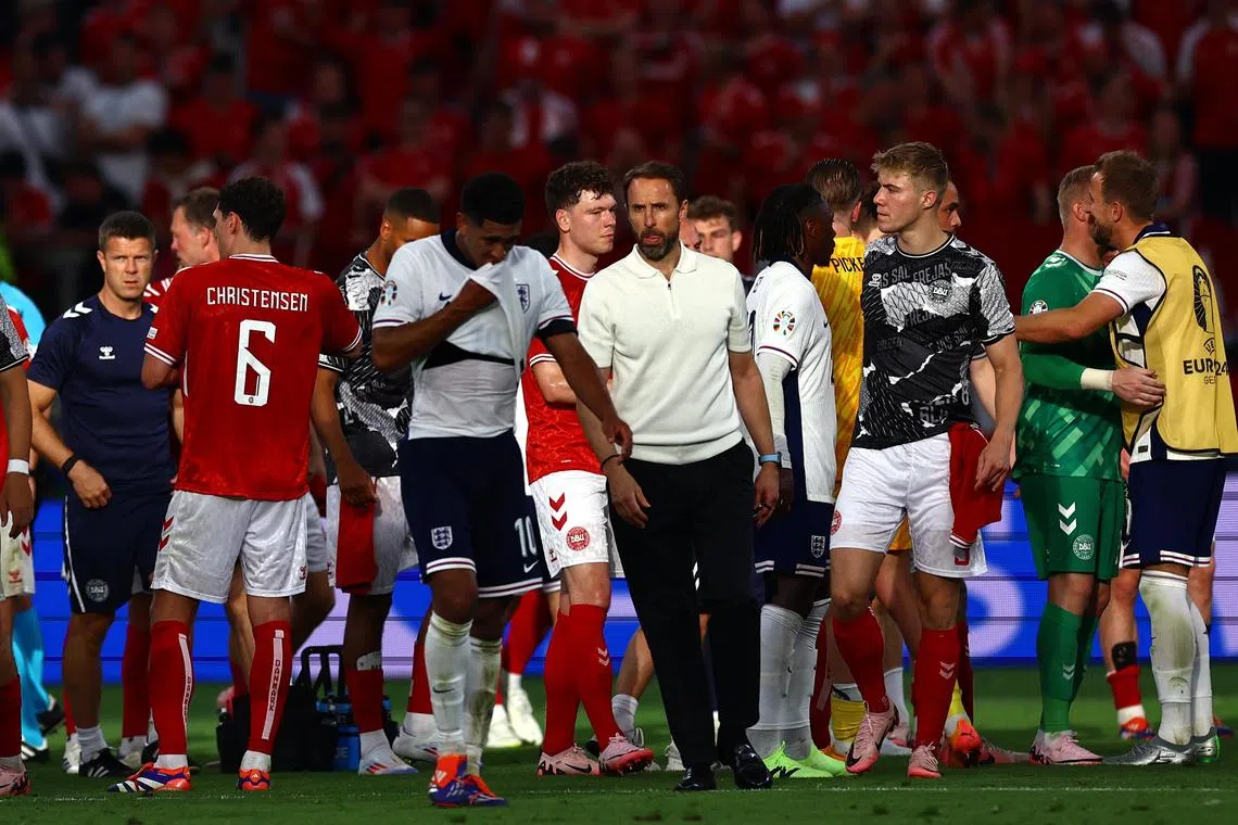 Southgate (centre) said the key to England’s failings against a combative and intelligent Danish side was their failure to press hard enough and a lack of quality on the ball.