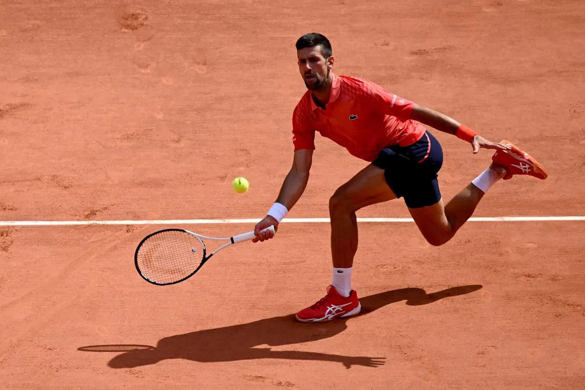 Novak Djokovic in action against Carlos Alcaraz in their French Open semi-final.