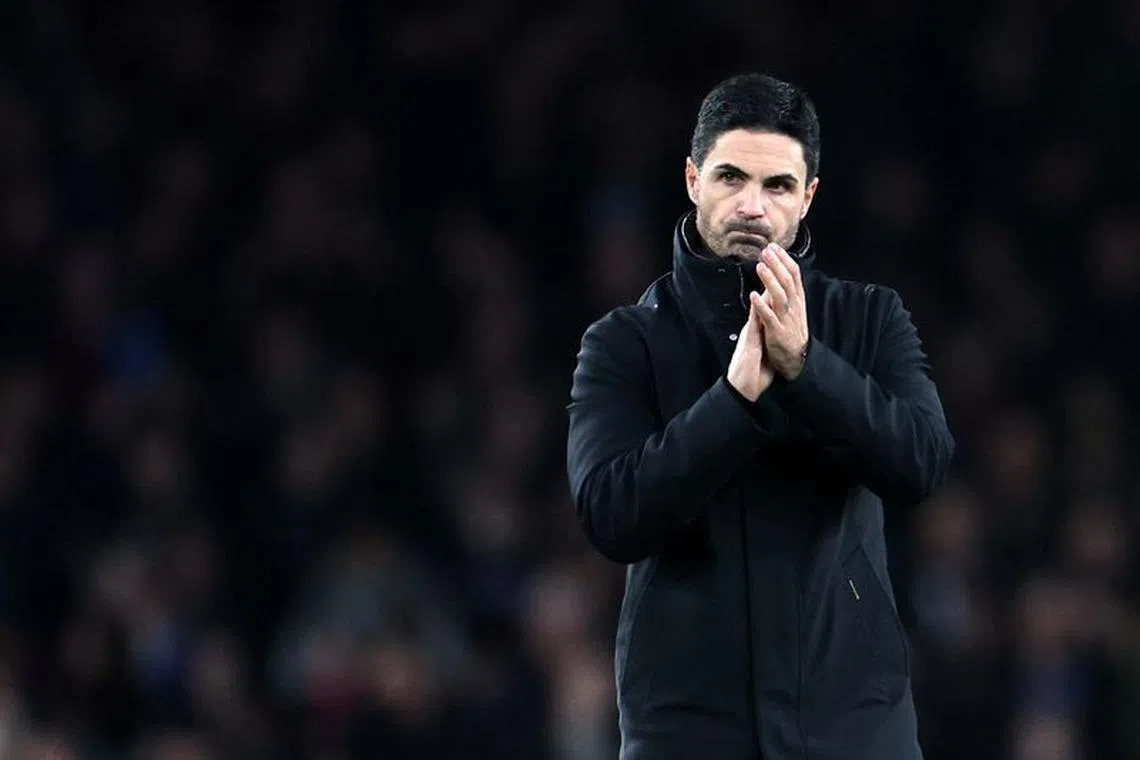 Soccer Football - Premier League - Arsenal v West Ham United - Emirates Stadium, London, Britain - December 28, 2023  Arsenal manager Mikel Arteta applauds fans after the match REUTERS/Isabel Infantes/file photo