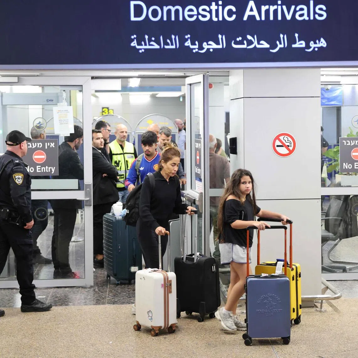 Passengers from diverted flydubai flight FZ1073 arriving back in Israel on Sept 30. Israel said a co-pilot on the flight to Tel Aviv had stabbed the pilot and attempted to crash the plane.
