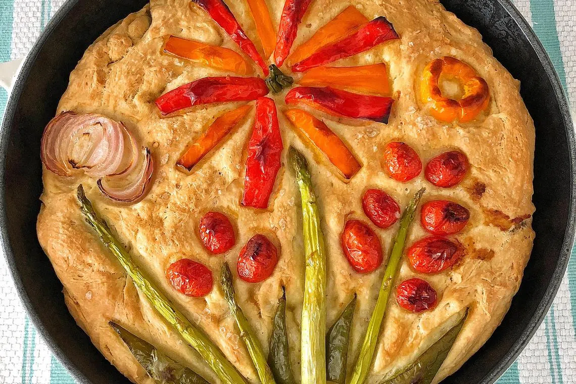 Making garden focaccia - Large pieces of vegetables work better than fiddly slices.