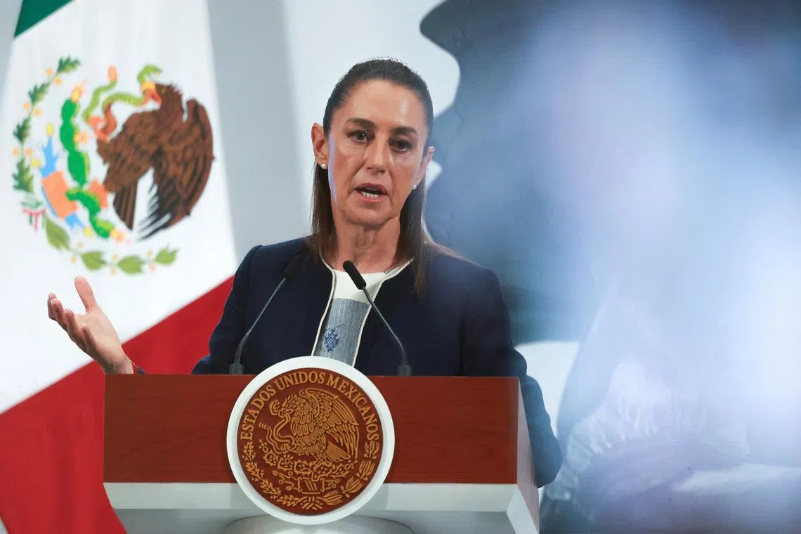 FILE PHOTO: Mexico's President Claudia Sheinbaum speaks during a press conference in Mexico City, Mexico, July 14, 2025. REUTERS/Raquel Cunha/File Photo