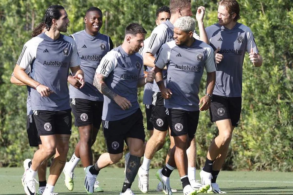 FILE PHOTO: Soccer Football - MLS - Inter Miami Training - DRV PNK Stadium, Fort Lauderdale, Florida, United States - July 18, 2023 Inter Miami's Lionel Messi with Josef Martinez and teammates during training REUTERS/Marco Bello/File photo