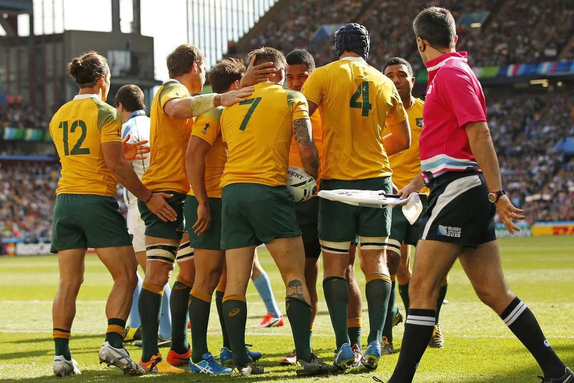 FILE PHOTO: Rugby Union - Australia v Uruguay - IRB Rugby World Cup 2015 Pool A - Villa Park, Birmingham, England - 27/9/15  Australia's Sean McMahon celebrates with team mates after scoring their first try  Action Images via Reuters / Andrew Boyers  Livepic/File Photo