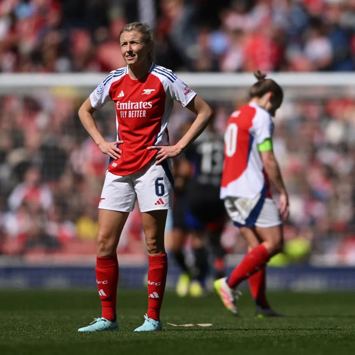 Soccer Football - Women's Champions League - Semi Final - First Leg - Arsenal v Olympique Lyonnais - Emirates Stadium, London, Britain - April 19, 2025 Arsenal's Leah Williamson looks dejected after the match REUTERS/Jaimi Joy