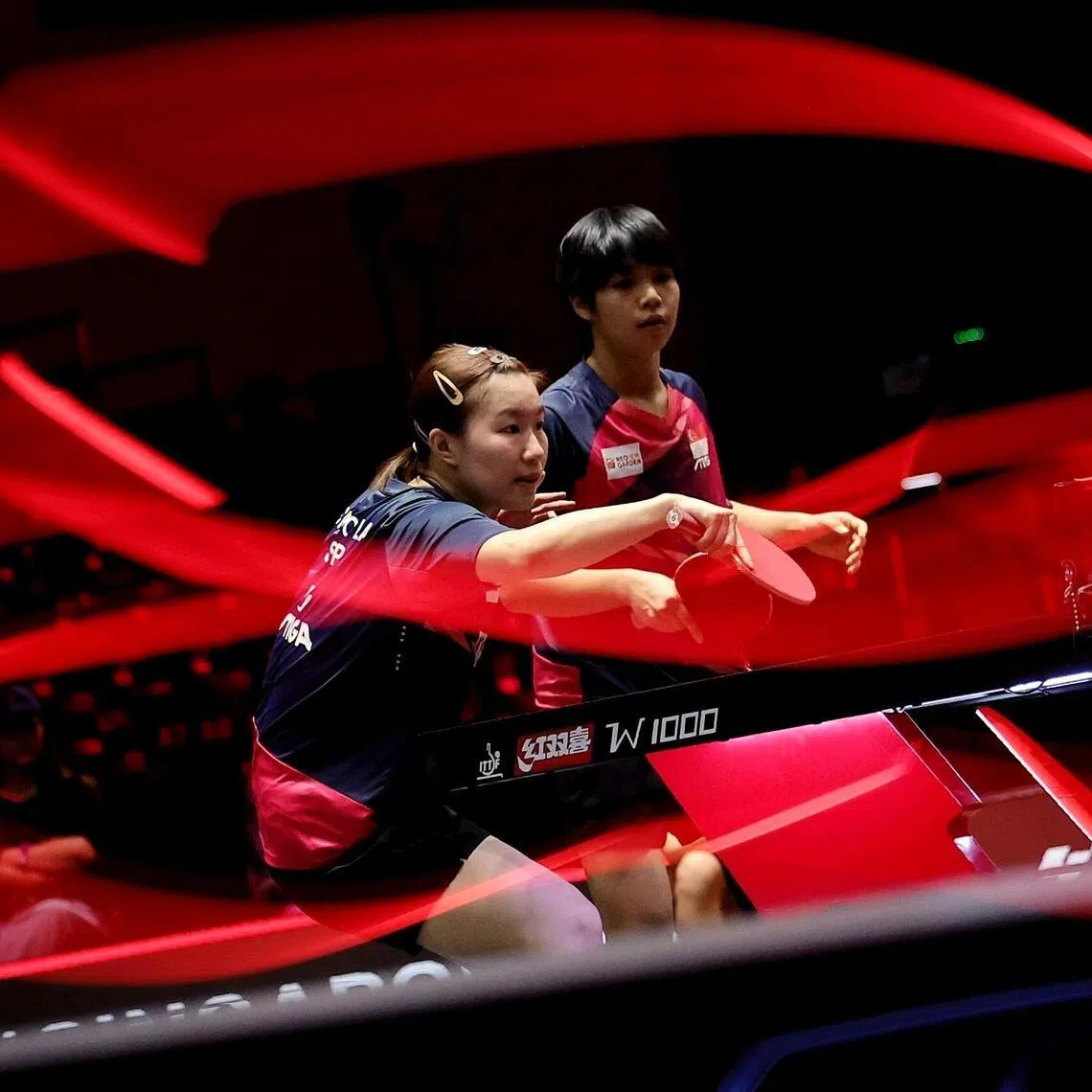 Chloe Lai (left) and Loy Ming Ying of Singapore in action against Hina Hayata and Miwa Harimoto of Japan in the women's doubles quarter-finals at Singapore Smash on Feb 25. 