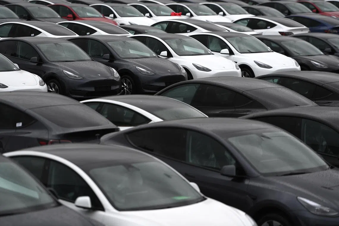 epa10622718 New Tesla cars at a distribution centre in London, Britain, 12 May 2023. UK gross domestic product (GDP) increased by 0.1% between January and March, the Office for National Statistics (ONS) revealed. However, despite the launch of new number plates, cars sales were low by historic standards – continuing the trend seen since the start of the pandemic – with warehousing, distribution and retail also having a poor month.  EPA-EFE/NEIL HALL