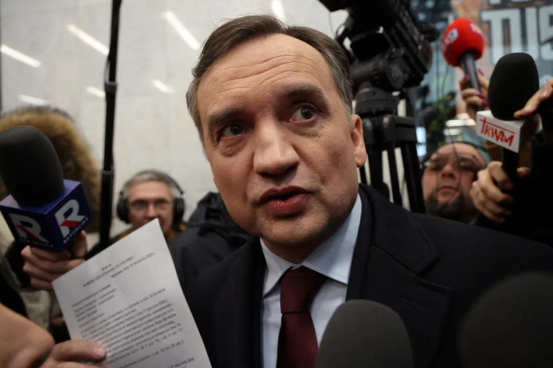 Member of the Law and Justice (PiS) party and former Polish Justice Minister Zbigniew Ziobro reacts after he was detained by police at the Polish TV Republika station's headquarters to be brought to testify before the Pegasus Investigation Committee, in Warsaw, Poland January 31, 2025. Agencja Wyborcza.pl/Robert Kowalewski/via REUTERS