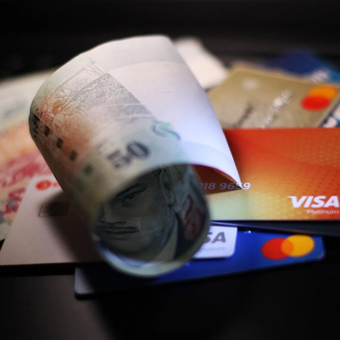 Sharing credit card details, OTP in scams is not gross negligence, but ignoring repeated warnings is, said the Small Claims Tribunal.
