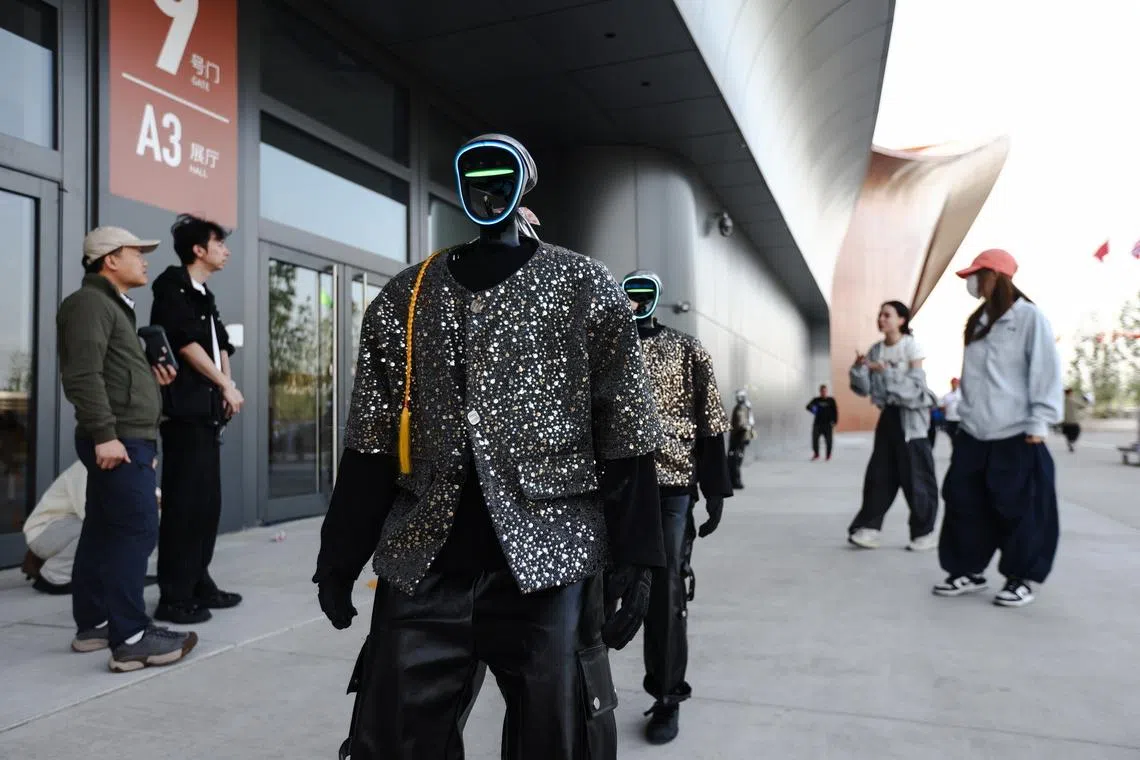 Humanoid robots rehearsing outside the 2026 Beijing International Automotive Exhibition in Beijing, China, on April 22, ahead of the exhibition opening on April 24. 