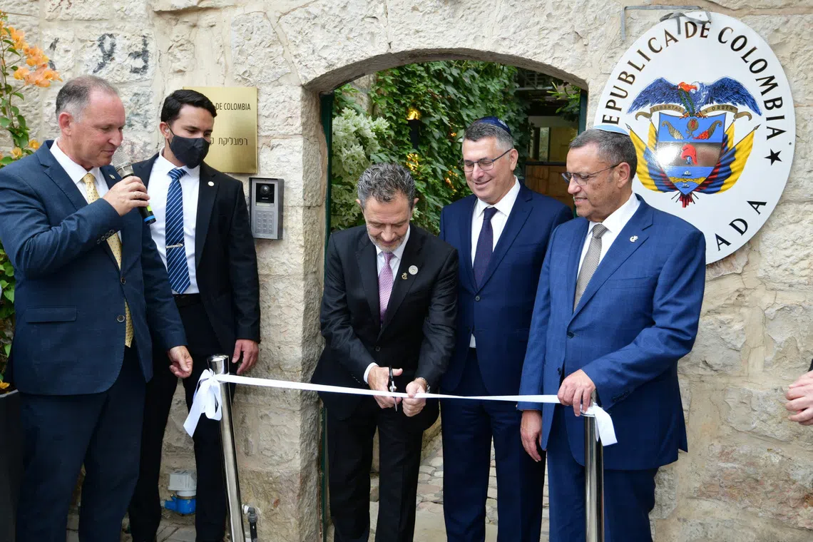 Colombian Foreign Minister Omar Bula cuts a ribbon as Israeli Foreign Minister Gideon Saar stands by  during the opening of Colombia's embassy in Jerusalem, October 14, 2026. Rafi Ben Hakoon, GPO/Handout via REUTERS