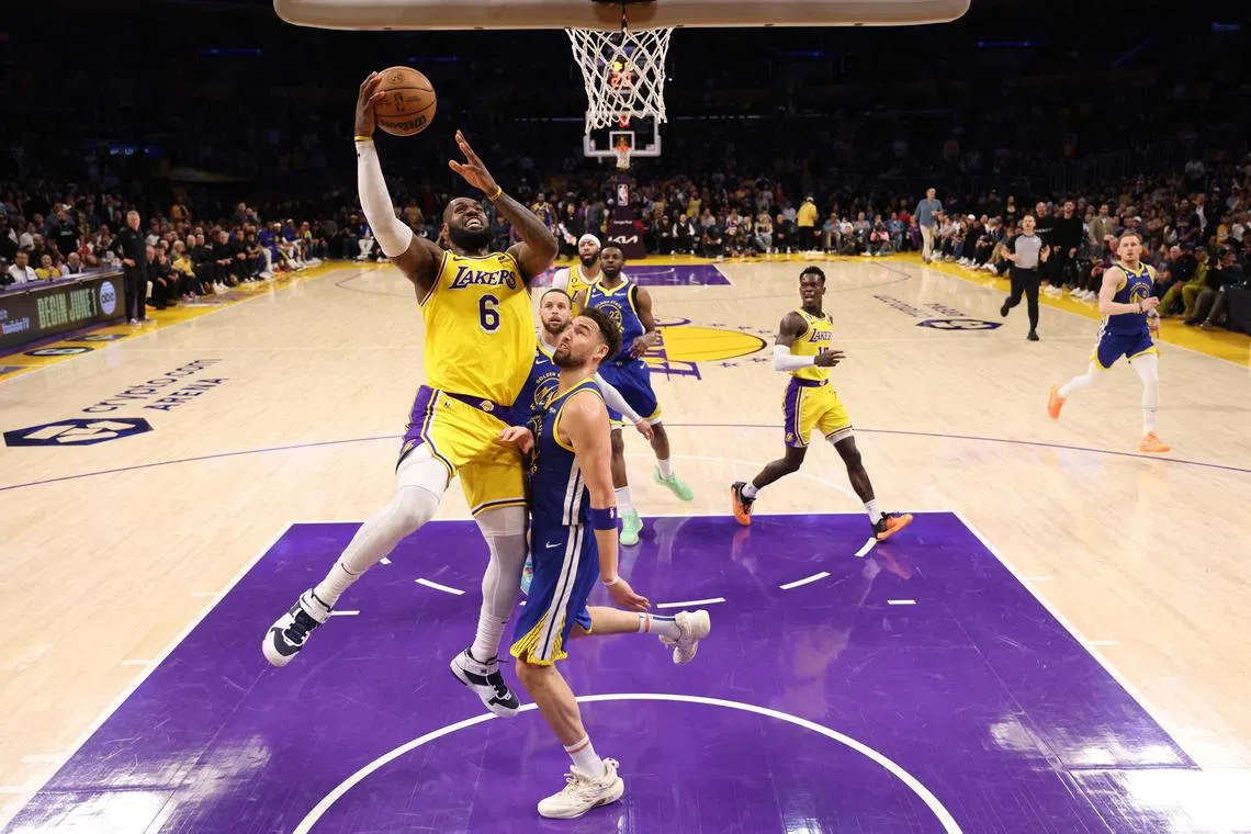LeBron James of the Los Angeles Lakers attempts a layup against Klay Thompson of the Golden State Warriors during Game 6 of their NBA Western Conference semi-finals.