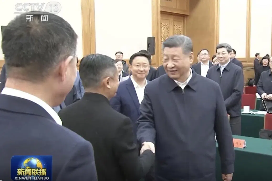 China's President Xi Jinping seen shaking hands with Alibaba's founder and former chairman Jack Ma in a Beijing meeting on Jan 17.