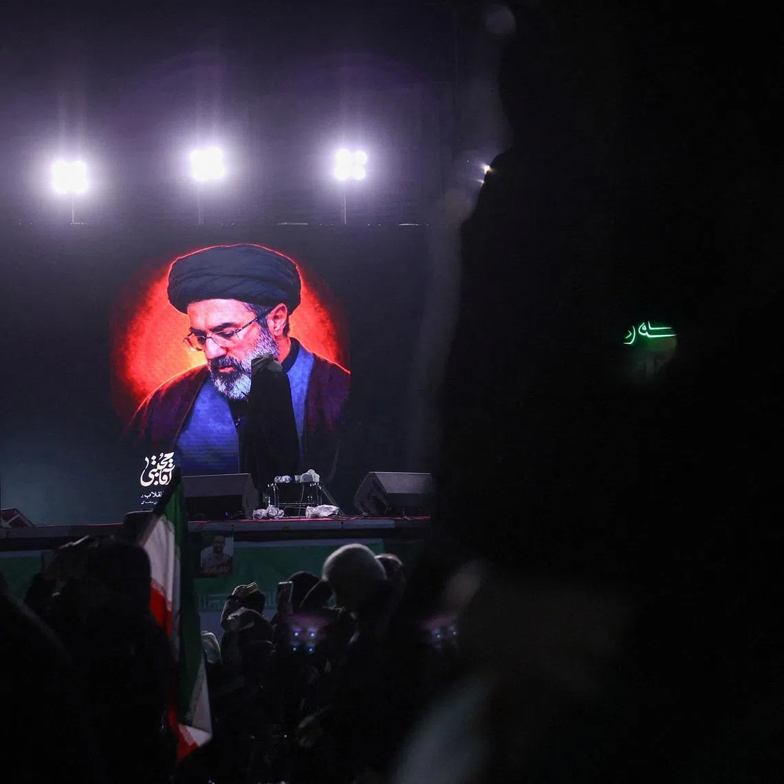 A picture of Iran's new supreme leader, Mojtaba Khamenei, is displayed on a screen in Tehran, amid the U.S.-Israeli conflict with Iran, in Tehran, Iran, March 9, 2026. Majid Asgaripour/WANA (West Asia News Agency) via REUTERS