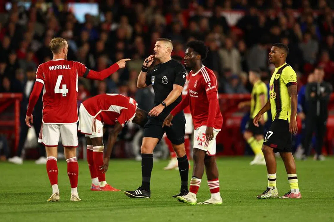 Soccer Football - Premier League - Nottingham Forest v Burnley - The City Ground, Nottingham, Britain - September 18, 2023 Burnley's Lyle Foster reacts before being shown a red card by referee Robert Jones Action Images via Reuters/Andrew Boyers