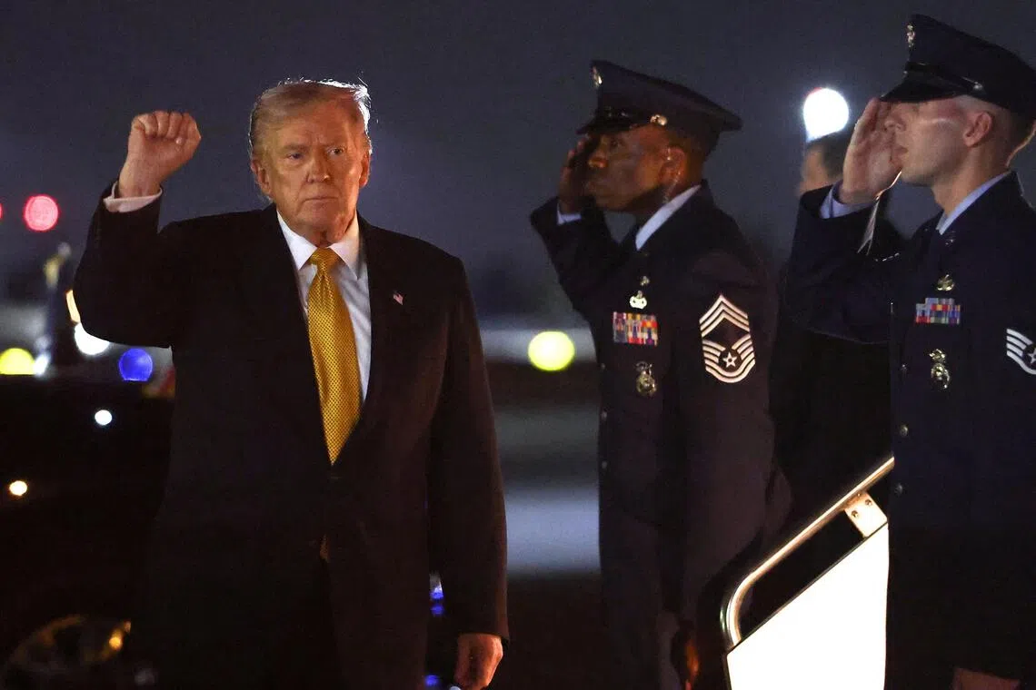 US President Donald Trump pumping his fist on Nov 7, as he arrives in Florida aboard Air Force One for the weekend.