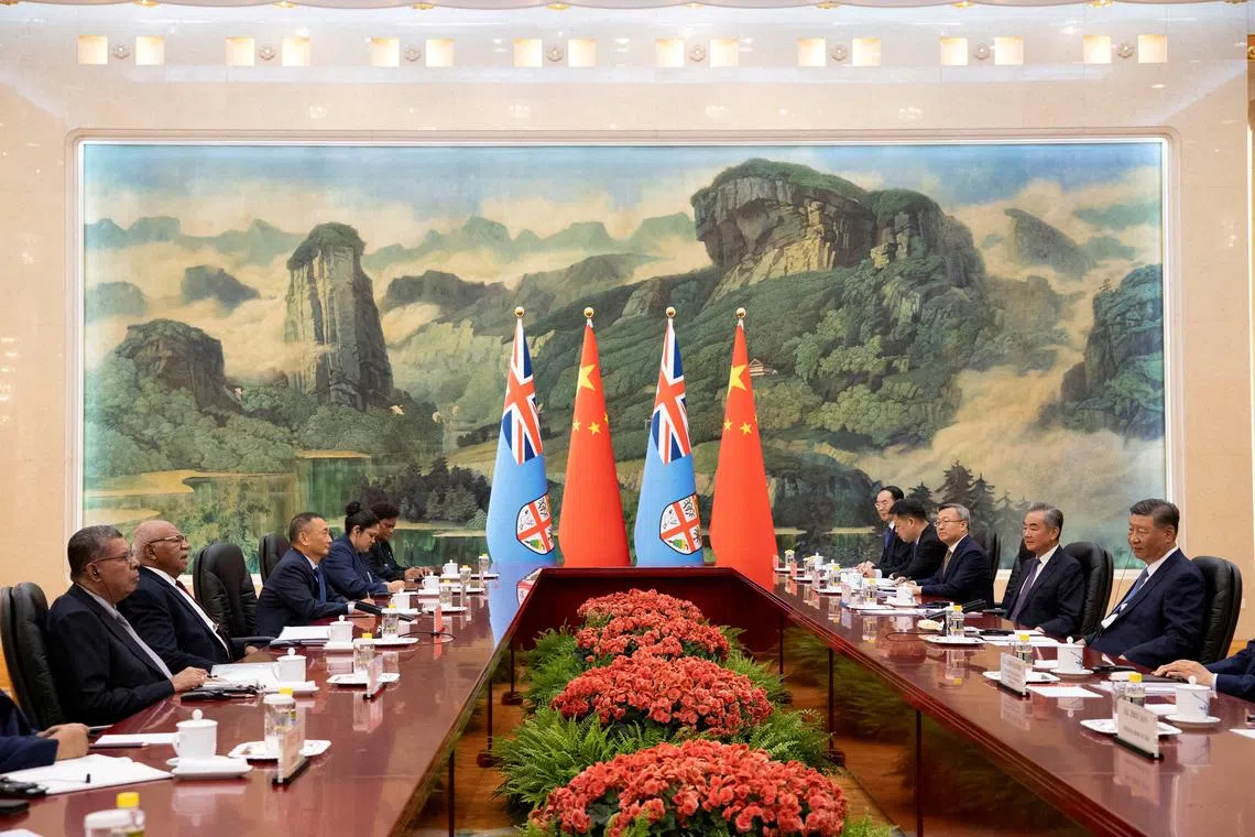 FILE PHOTO: Fiji's Prime Minister Sitiveni Rabuka and Chinese President Xi Jinping attend a meeting at the Great Hall of the People in Beijing, China, August 20, 2024. ANDRES MARTINEZ CASARES/Pool via REUTERS/File Photo