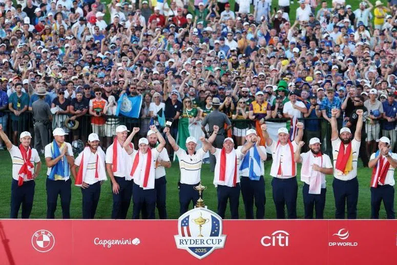 Team Europe celebrates their 15-13 win over Team America during the trophy presentation ceremony.