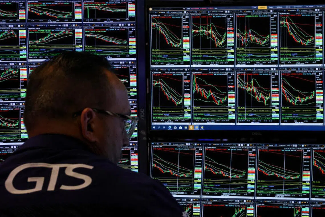 Caption:
A trader works on the floor at the New York Stock Exchange (NYSE) in New York City, U.S., April 21, 2025. REUTERS/Brendan McDermid
