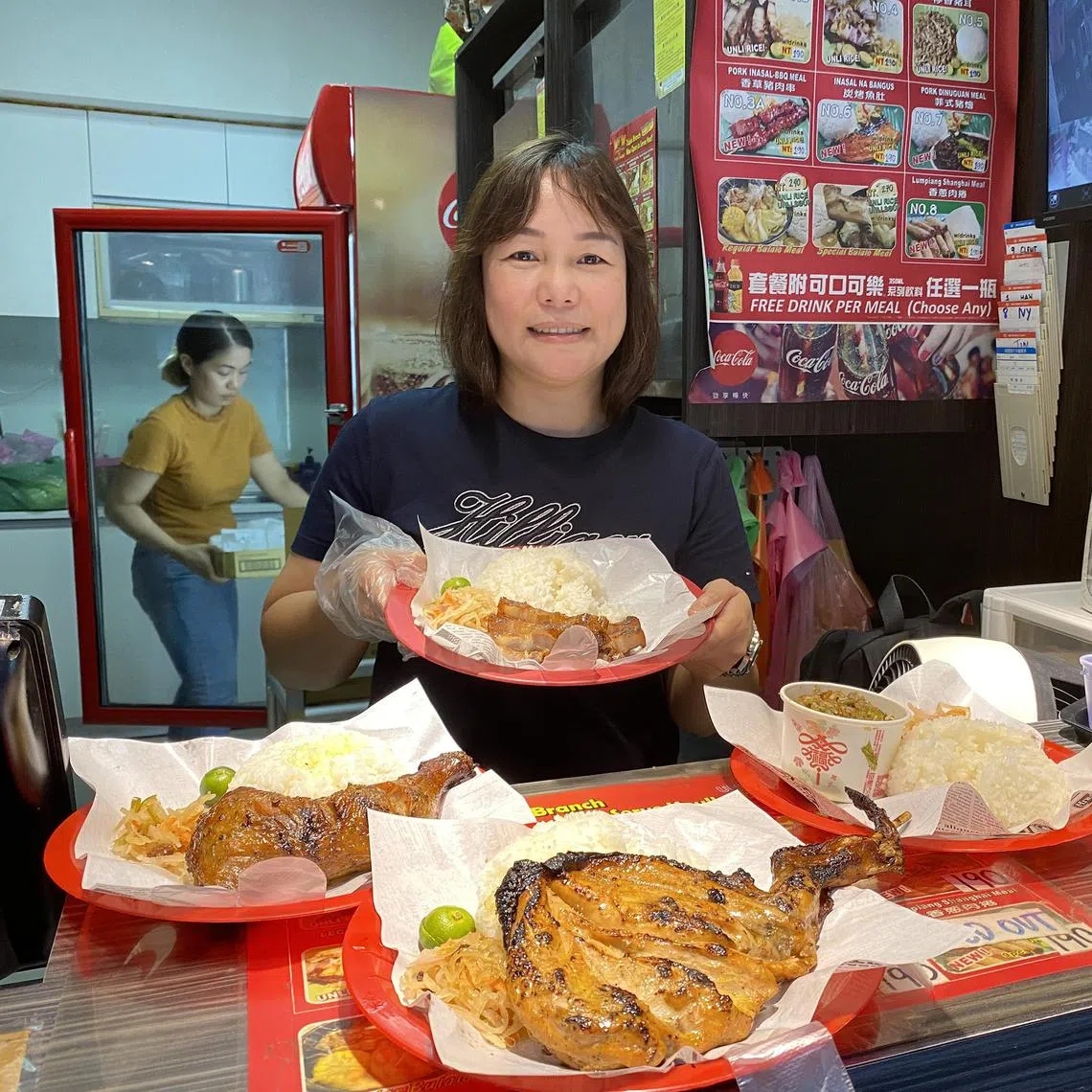 wyyfilipino - Ms Grace Saparco cooks authentic Filipino dishes at her eatery in Taipei's "Little Manila".
ST PHOTO: YIP WAI YEE