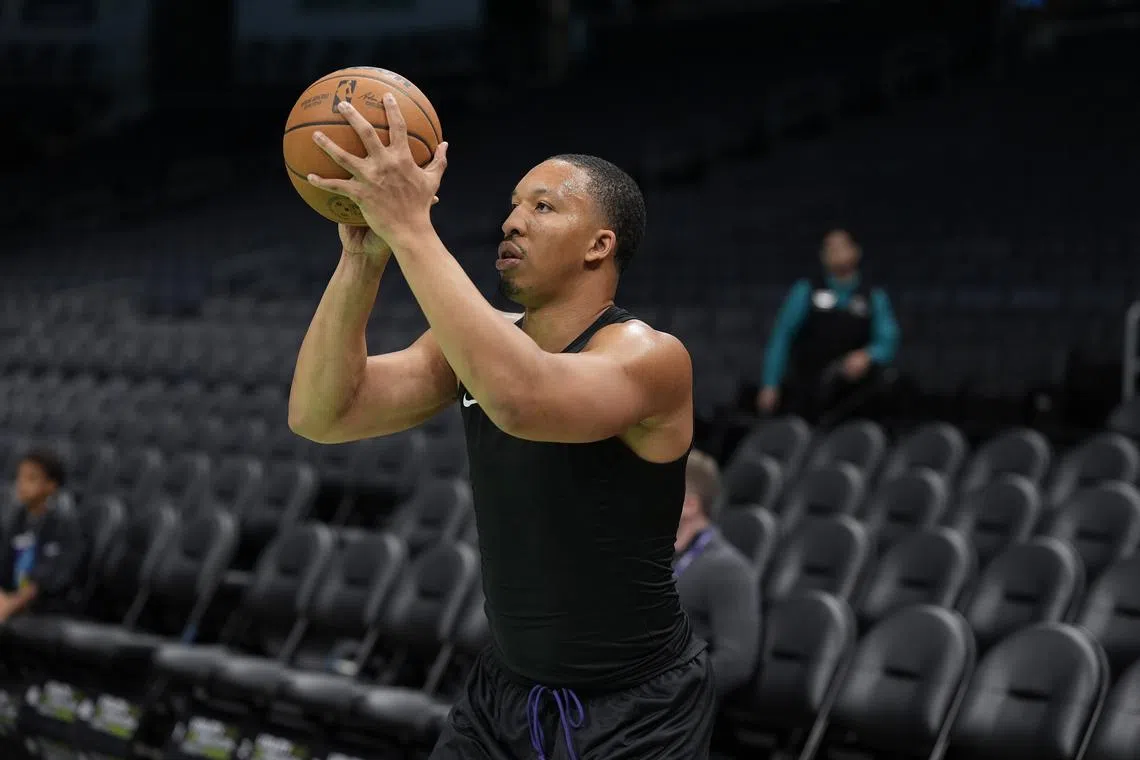 FILE PHOTO: Nov 16, 2024; Charlotte, North Carolina, USA; Charlotte Hornets forward Grant Williams (2) during pregame warmups against the Milwaukee Bucks at Spectrum Center. Jim Dedmon-Imagn Images/File Photo