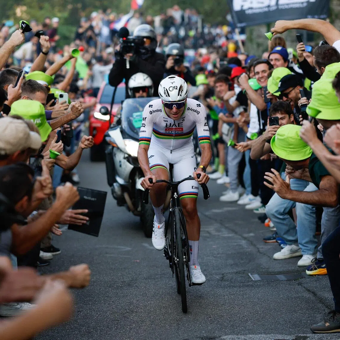 UAE Team Emirates-XRG's Slovenian rider Tadej Pogacar cycling in a lone breakaway in the final ascent to Bergamo to win the 119th edition of the Giro di Lombardia on Oct 11, 2025.