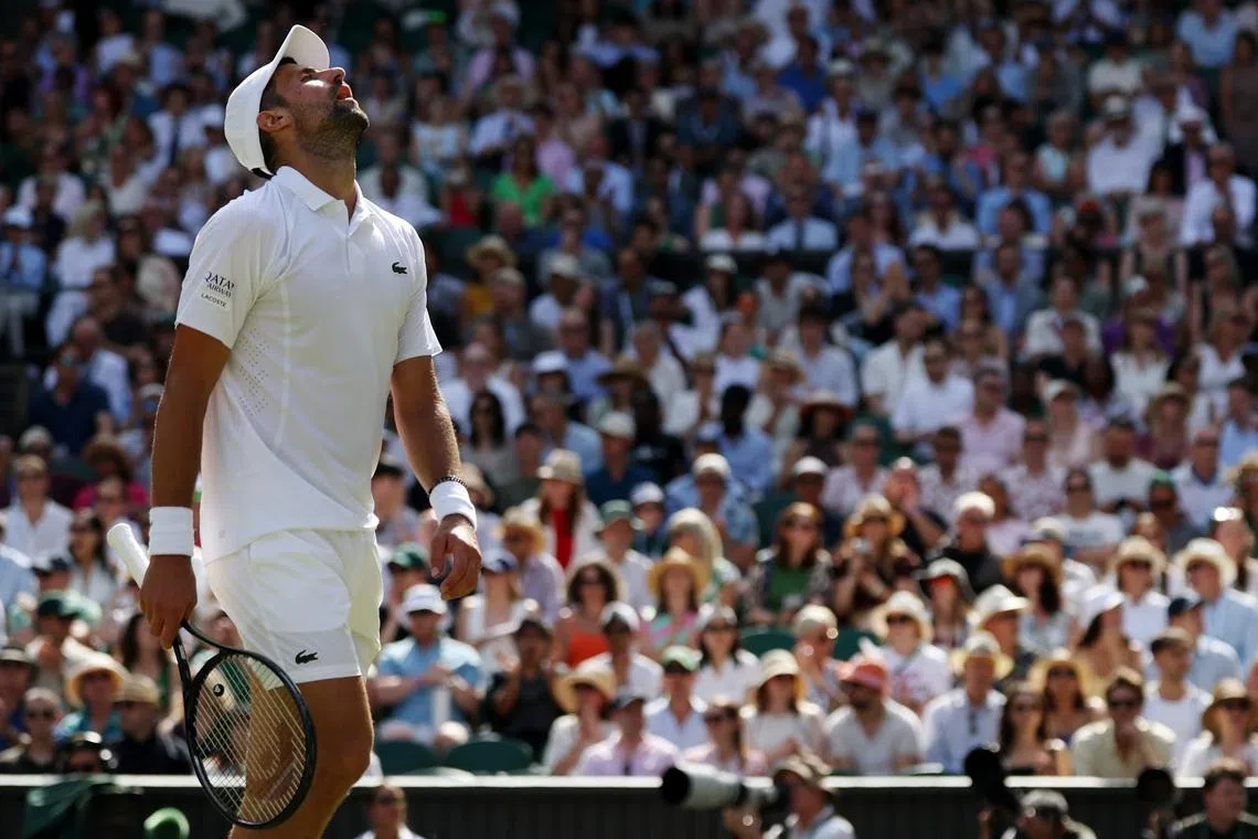 Jul 5, 2026; London, United Kingdom; Novak Djokovic (SRB) reacts after missing a shot against Roman Safiullin (not pictured) on day seven of The Championships Wimbledon 2026 at All England Lawn Tennis and Croquet Club. Mandatory Credit: Geoff Burke-Imagn Images