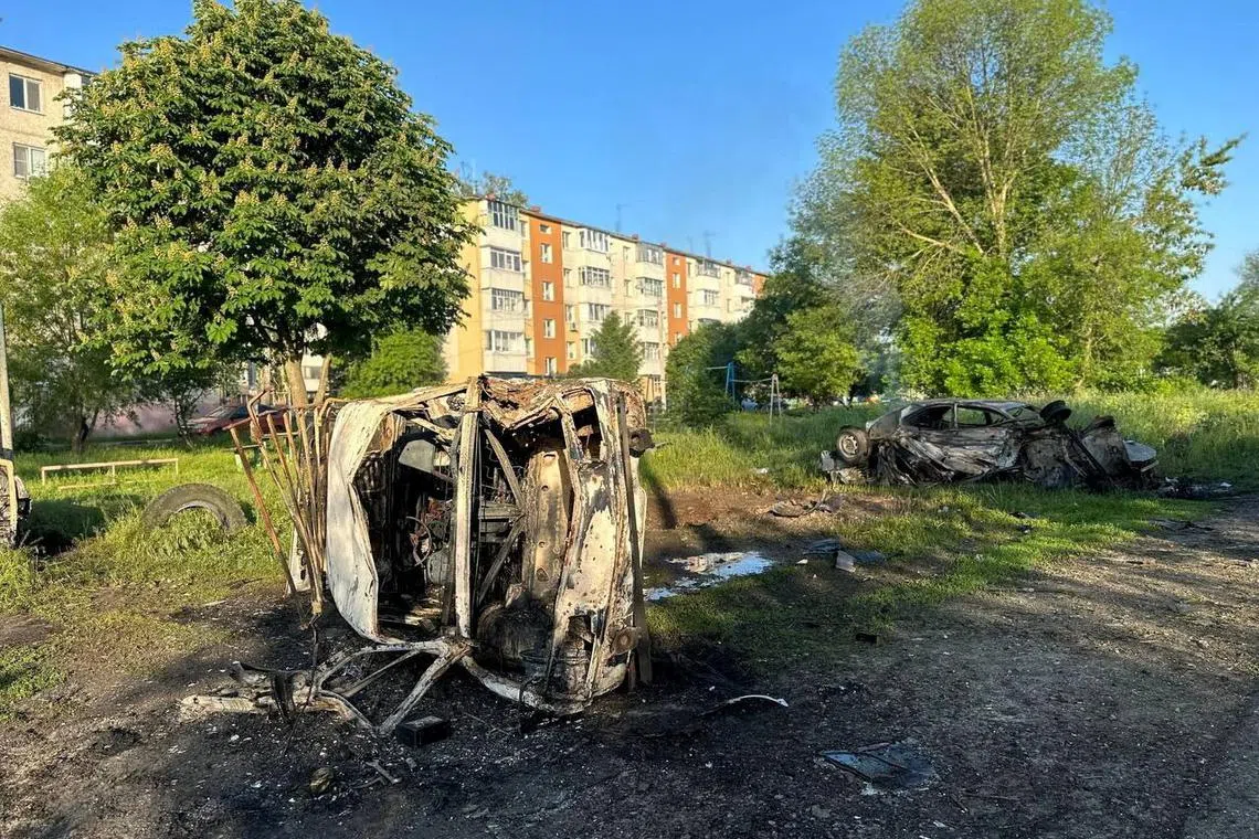 A view shows destroyed vehicles following what was said to be Ukrainian forces' shelling in the course of Russia-Ukraine conflict in the town of Shebekino in the Belgorod region, Russia.