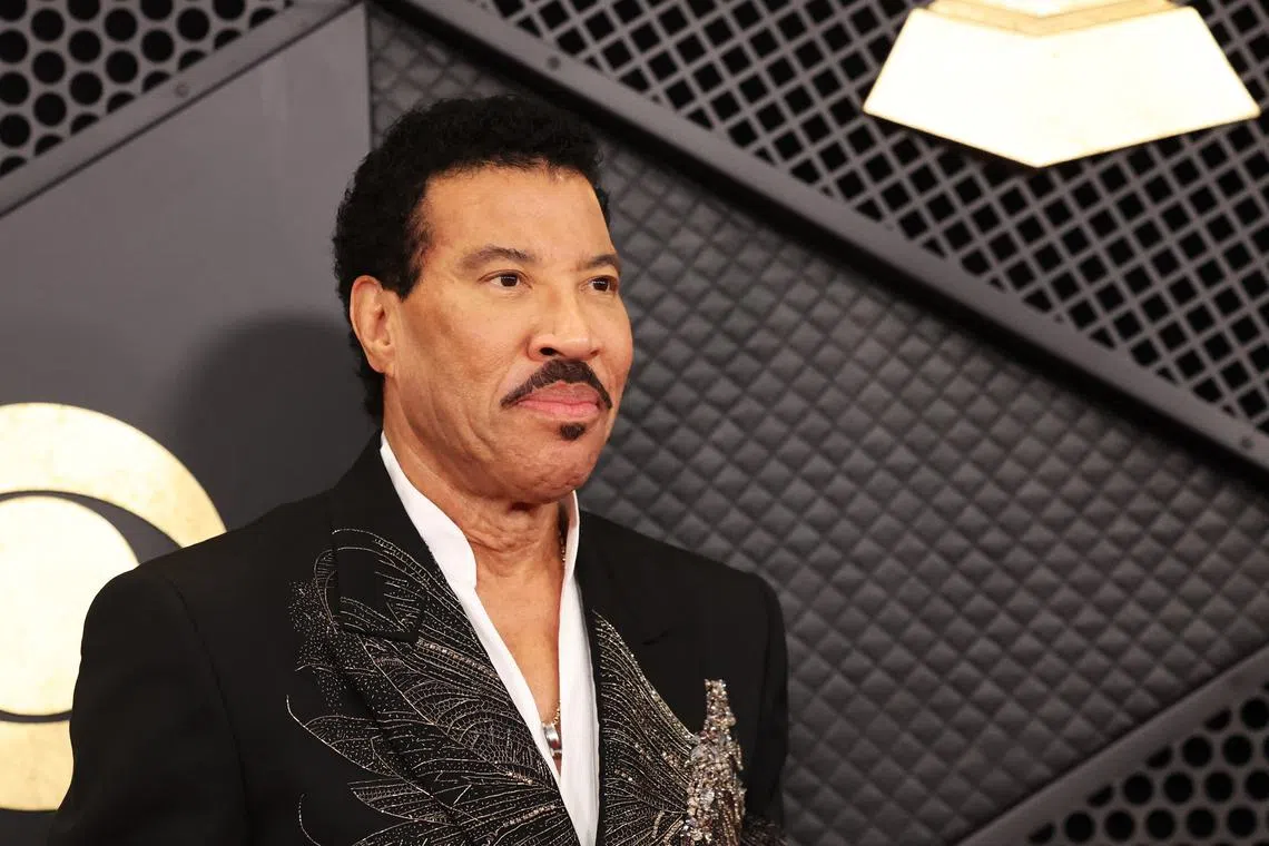 FILE PHOTO: Lionel Richie poses on the red carpet as he attends the 66th Annual Grammy Awards in Los Angeles, California, U.S., February 4, 2024. REUTERS/Mario Anzuoni/File Photo