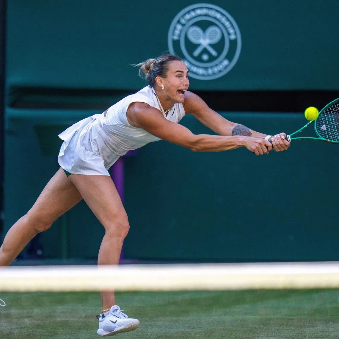 Jul 3, 2026; London, United Kingdom; Aryna Sabalenka returns a shot during her match against Jelena Ostapenko of Latvia on day five at All England Lawn Tennis and Croquet Club.  Mandatory Credit: Susan Mullane-Imagn Images