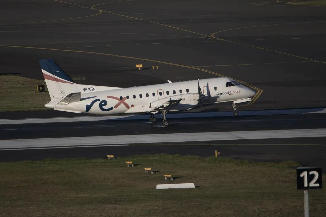 An aircraft operated by Rex Airlines lands at Sydney Airport in Sydney, Australia, on Aug 26, 2024. 
