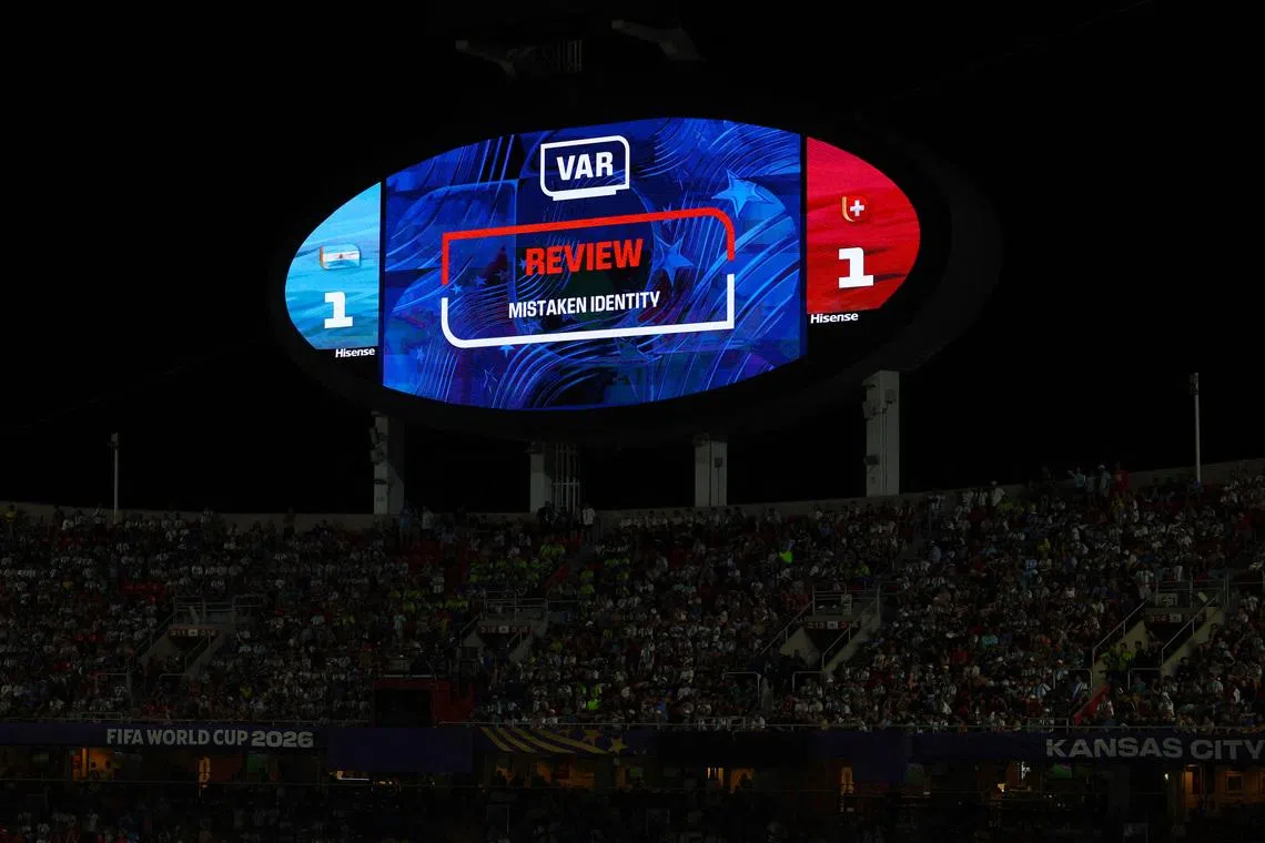 Soccer Football - FIFA World Cup 2026 - Quarter Final - Argentina v Switzerland - Kansas City Stadium, Kansas City, Missouri, U.S. - July 11, 2026 General view as the big screen displays a message before Switzerland's Breel Embolo is shown a red card by referee Joao Pinheiro after a VAR review REUTERS/Albert Gea