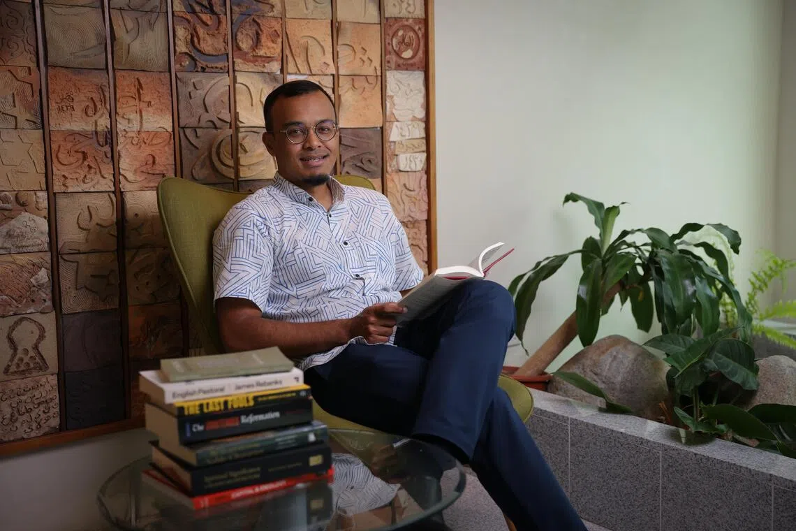 Mr Khairul Anwar, deputy chief executive of Muis, enjoys audiobooks on his drive. 