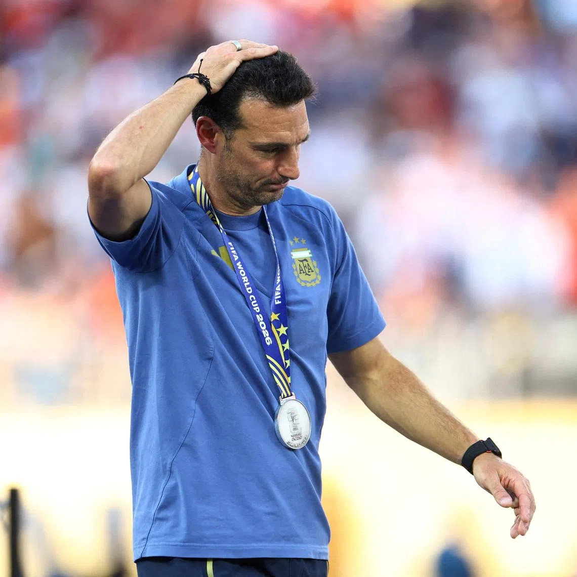 Soccer Football - FIFA World Cup 2026 - Final - Spain v Argentina - New York/New Jersey Stadium, East Rutherford, New Jersey, U.S. - July 19, 2026 Argentina coach Lionel Scaloni wears his runners up medal during the trophy presentation REUTERS/Hannah Mckay