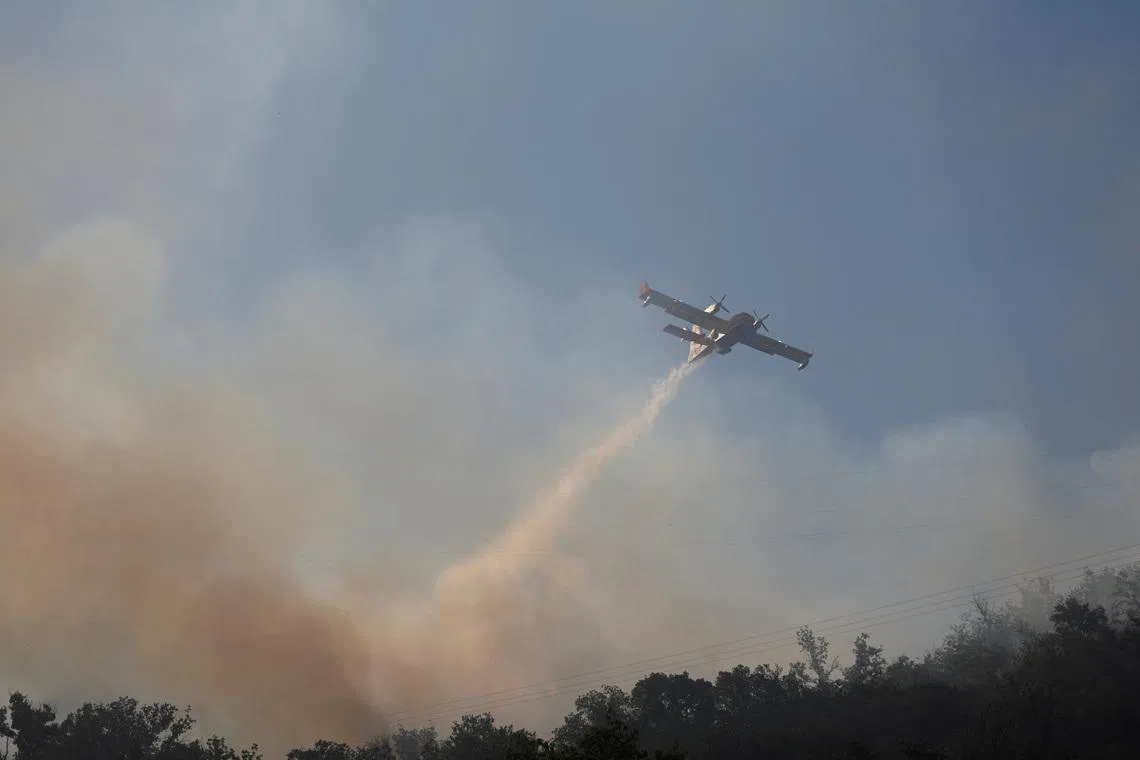 Thousands evacuated from homes in south-west France as wildfire burns