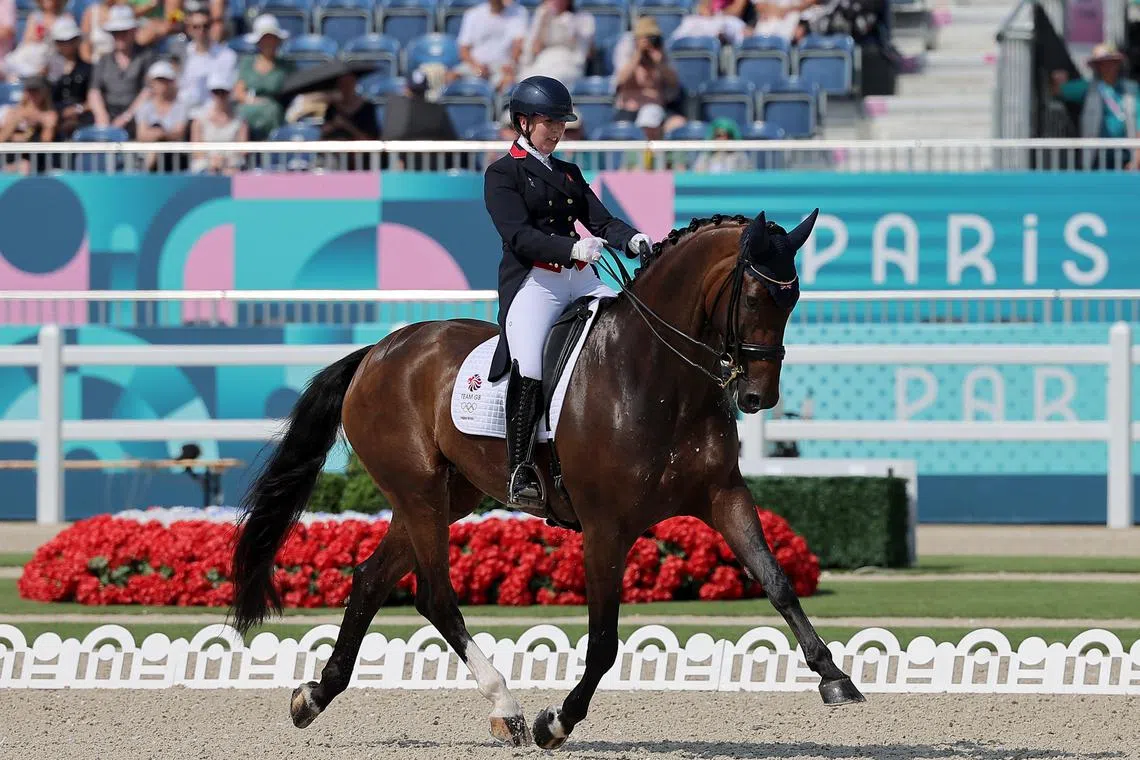 Equestrian-Denmark tops dressage qualifiers in first Grand Prix day ...