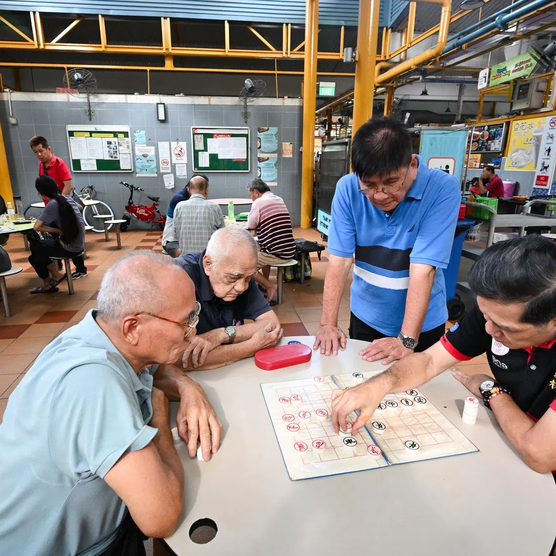 ST20250405-202529200210-Lim Yaohui-Wong Pei Ting-pteastcoast07/

Men playing Chinese chess inside Bedok 85 Market at 85 Bedok North Street 4 on April 5, 2025. 

Constituency report for East Coast GRC.

(ST PHOTO: LIM YAOHUI)