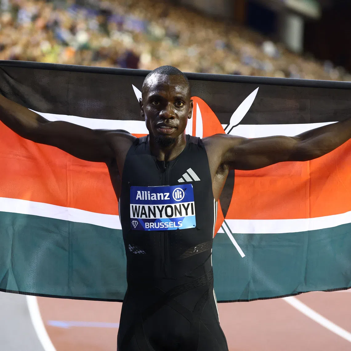 Athletics - Diamond League - Brussels - King Baudouin Stadium, Brussels, Belgium - September 4, 2026  Kenya's Emmanuel Wanyonyi celebrates with a flag after winning the men's 800m final and setting a new meeting record REUTERS/Piroschka Van De Wouw