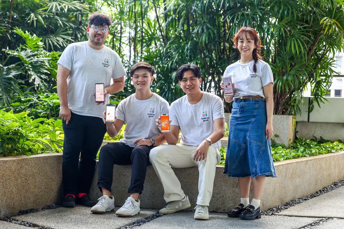  Jackie Tan (35), Product Manager; Richard Xiong (25) Full Stack Dev; Joshua Lai (23) Backend Engineer and  Jocelyn Teo (30) Experience Designer from Team EBI (Emotional Baggage Interface), poses for a portrait at National Library on Nov 30, 2024. EBI is a companion application that helps mental health support seekers describe their issues more quickly and seamlessly with any therapist.