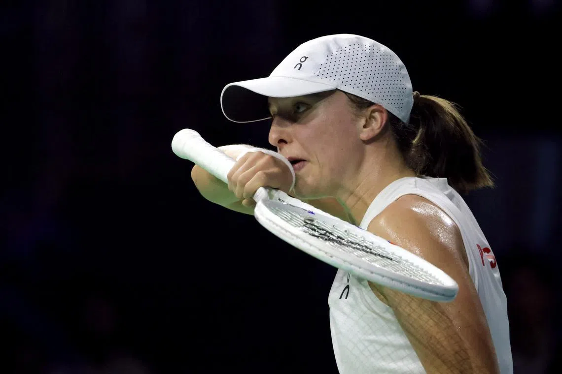 Tennis - Billie Jean King Cup Finals - Semi Final - Poland v Italy - Palacio de Deportes Jose Maria Martin Carpena Arena, Malaga, Spain - November 18, 2024 Poland's Iga Swiatek reacts during her match against Italy's Jasmine Paolini REUTERS/Jon Nazca/File Photo