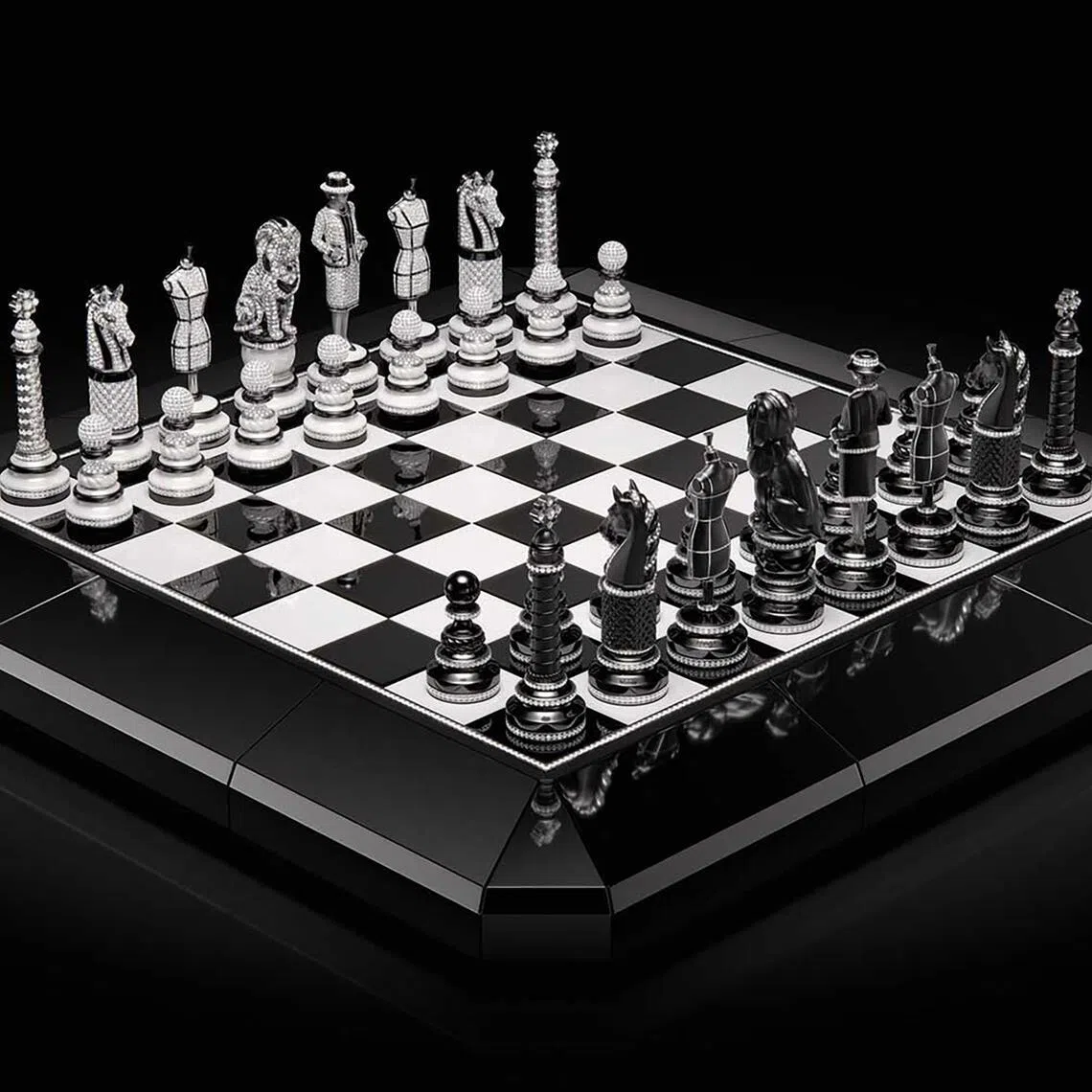 The Coco Game Chess Set with pieces crafted in ceramic, white gold and diamonds. The queen pieces hide timepieces that can be paired with a chain. 