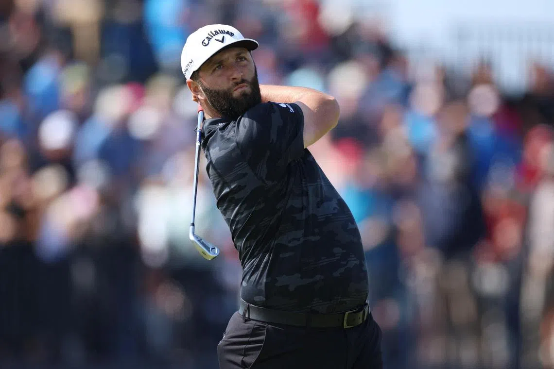 Spain's Jon Rahm tees off on the fourth hole during the first round.
