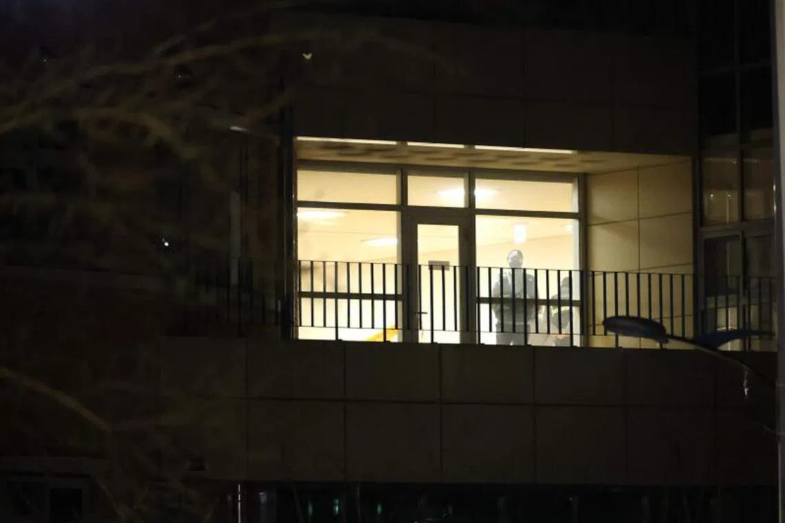 Police pictured inside an elementary school building in Daejeon, 160 kilometers south of Seoul, on February 10, 2025. A teacher stabbed an eight-year-old student to death at an elementary school in South Korea on February 10, 2025, local media reported, citing authorities. (Photo by YONHAP / AFP) / - South Korea OUT / NO ARCHIVES - RESTRICTED TO SUBSCRIPTION USE