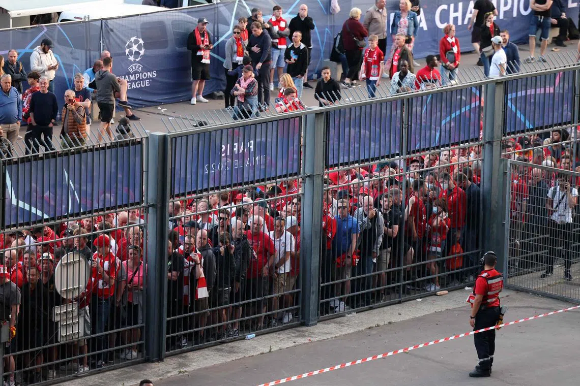 Liverpool fans stand outside unable to get in in time on May 28, 2022.
