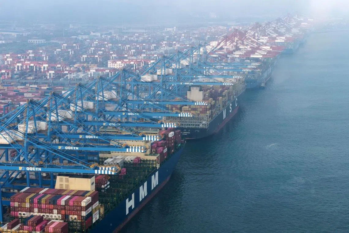 Container ships moored at the Qingdao Port in Qingdao, China, on Thursday, July 10, 2025. The world's two biggest economies agreed in May to lower their tariffs on each others’ exports for 90 days, with the US reducing its levies on most Chinese imports to 30%, from an earlier level of 145%. Source: Bloomberg